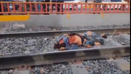 Death Of Injured Woman Lying Between The Rails