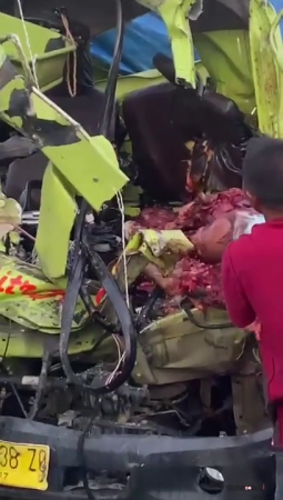 Extracting A Piece Of Meat From A Destroyed Car That Was Previously A Driver