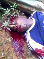 Dying Dude Breathes Through His Eye As His Mouth Is Covered In Blood