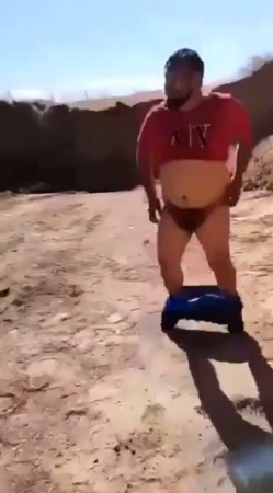 A Man Is Punished With Blows On His Bare Ass With A Board