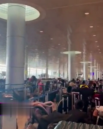 During The Shelling, People Hide In Panic Under The Reception Desks. Ben Gurion Airport