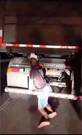 A Truck Driver Was Driving With A Dead Motorcyclist Pinned Under The Truck