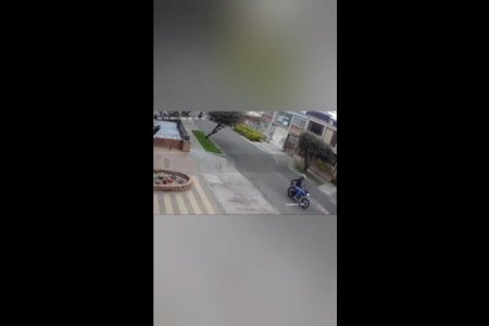Two Criminals On A Motorcycle Robbed A Pedestrian. Bogota, Colombia