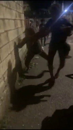 Woman Fights Holding Baby In Her Arms Then Throws Him. Jamaica
