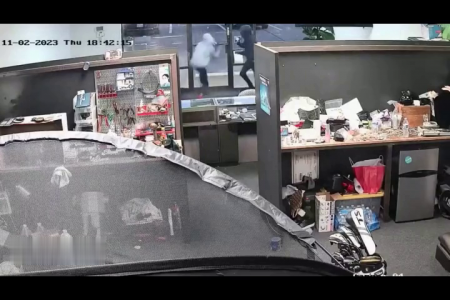 Instant Reaction Of A Store Owner To An Armed Robber