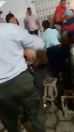 Machete Spanking And Chair Thrown In Street Brawl