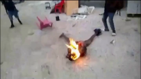 They Kick A Guy And Try To Burn Him Alive