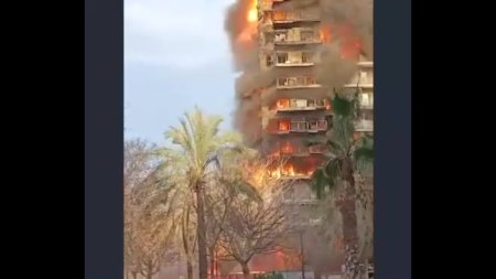 Fire Of A 14-Storey Building In Valencia. The Fire Cut Off People's Escape From The Upper Floors. Spain