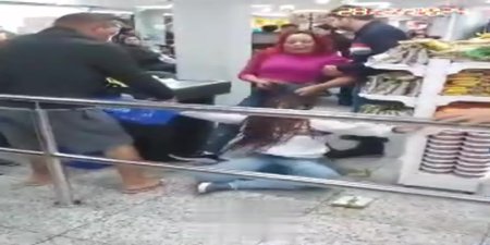 Conflict Between Women At The Store Checkout