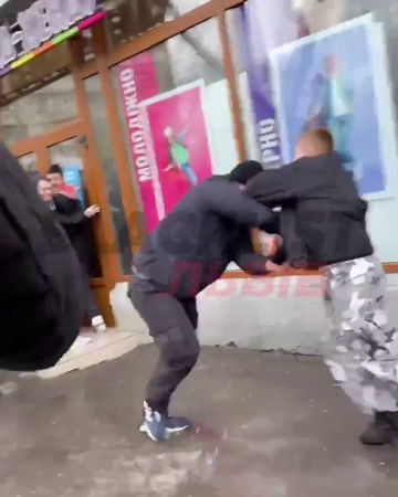 The Fight Of Ukrainian Teenagers For A Place In The Queue At The Store Of Worn Things From Europe