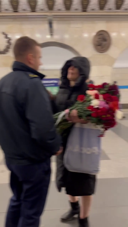Ukrainian Woman Tried To Throw Away Flowers Placed By People On The Memorial To The 133 Victims Of The Terrorist Attack At Crocus City Hall. Moscow