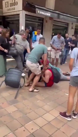 Guy Threatening People With A Knife vs Guy With A Chair. Spain
