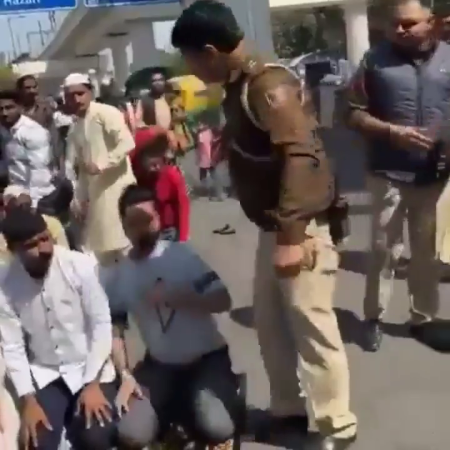 Policeman Kicks Away Muslims Praying On The Road. India