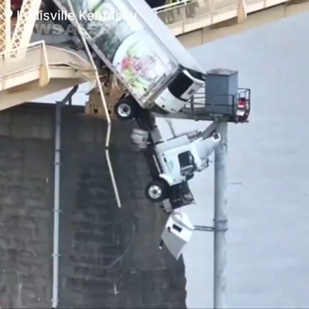 Dramatic Rescue Efforts Can Be Seen As Semi-Truck Dangles Off The Bridge Connecting Kentucky And Indiana