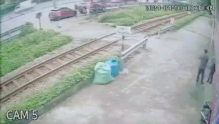 A Woman On A Motorcycle Was Hit By A Train