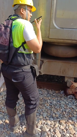 An Elderly Woman Is Trapped Under The Wheel Of A Train