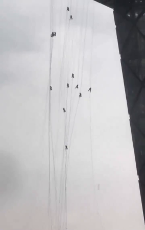 Several Glass Maintenance Workers In Beijing, China, Were Trapped Hanging From A Building After Sudden Strong Winds Hit The Area