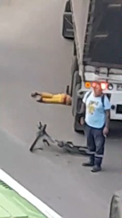 An Unfortunate Motorcyclist Who Died Under The Wheels Of A Huge Trailer. Colombia