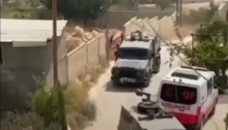 The Israeli Army Uses The Body Of A Wounded Palestinian To Protect It From Blowing Up A Convoy