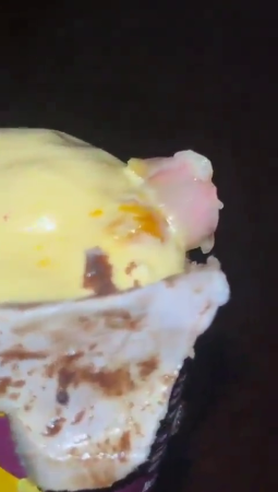 Ice Cream With A Man's Finger Inside