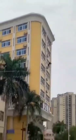 A Suicide Jump From The Roof Of An Apartment Building. China