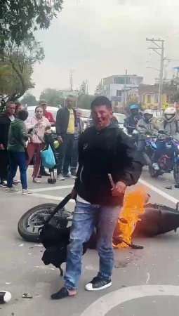 A Crowd Of Eyewitnesses On The Street Is Ready To Tear To Pieces The Caught Motorcycle Thief