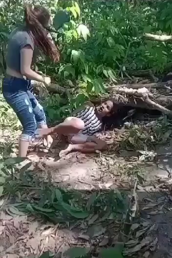 Woman Beating A Tied Up Woman In The Forest » UncensoredVideo - Latest News Without Censorship