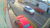 A Car That Lost Control Hit Two Motorcyclists And Crashed Into A Pole