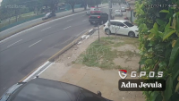 An Out-Of-Control Car Hits A Motorcyclist And Crashes Into A Parked Car