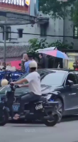 An Elderly Man With A Knife Attacked A Policeman And Was Shot. Guangzhou, China