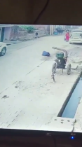 Two Criminals On A Motorcycle Shot A School Principal Walking Down The Street. India