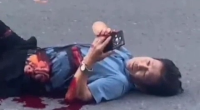 Dude Texting With His Guts Out