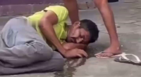 A Woman Pissed On A Drunk Man On The Street