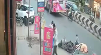 Footage Of A Woman Falling From A Motorcycle Under The Wheels Of A Bus