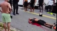 Thief Bleeding Out In The Street After Being Shot By Police