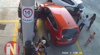 Stealing A Car At A Gas Station At Gunpoint. Mexico