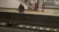 Dude Waiting For The Train To Arrive Lying On The Rails