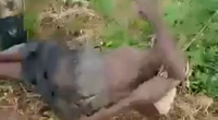 Black Dude Executed In Grave