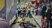 A Motorcyclist Stumbled And Fell Under The Wheels Of A Truck